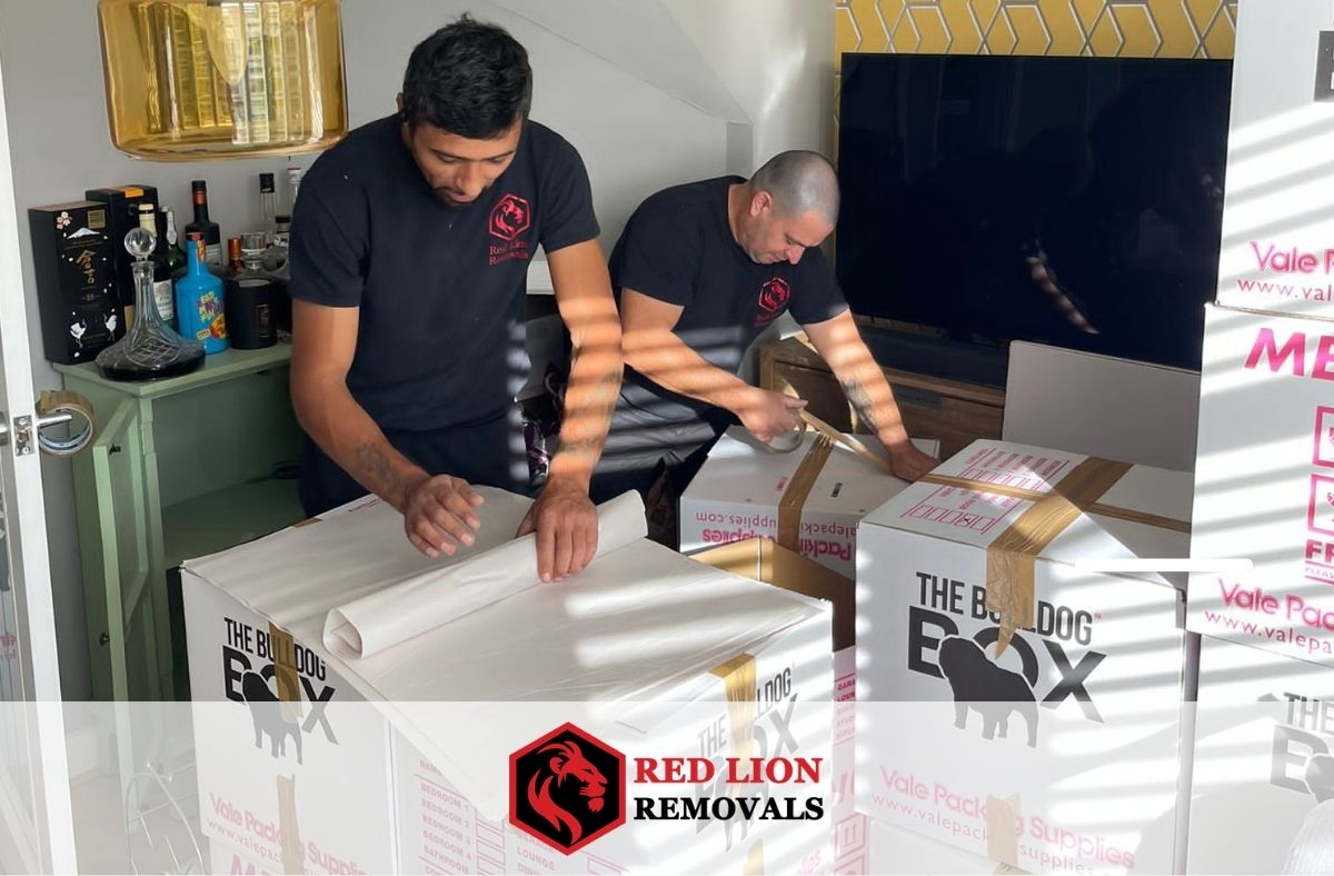 Bristol Removals two of the Red Lion Removals team packing featured image